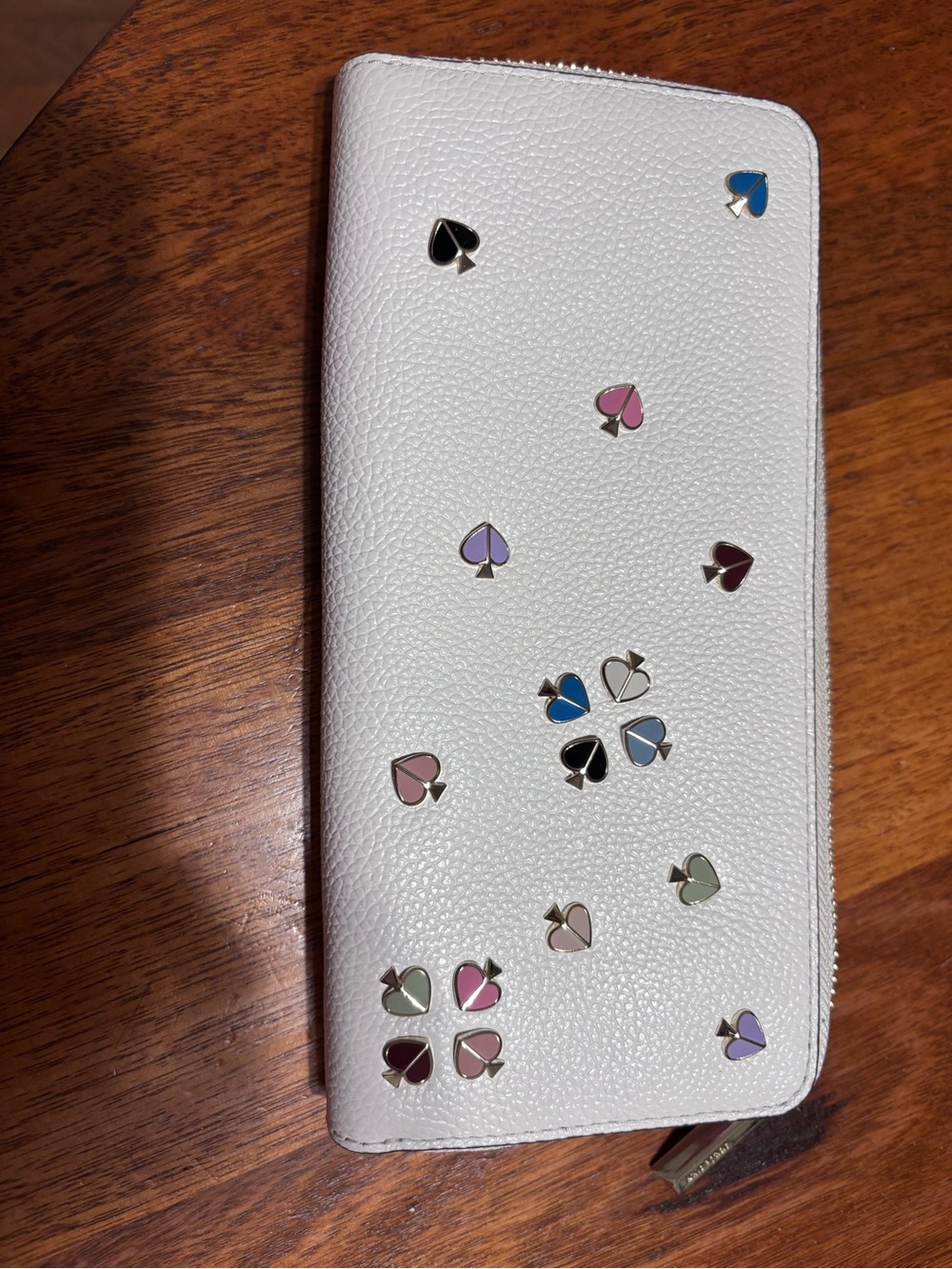Kate spade wallet with spade detailing
